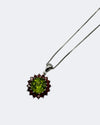 18kt White Gold Pendant with Olive Peridot and Rhodlite Halo.