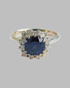 18kt White Gold Ring with Cushion Cut Tanzanite and Diamond Solitaire Halo